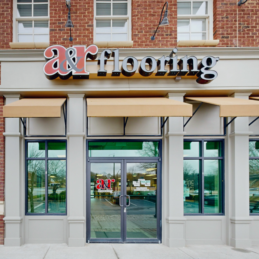 Buford local flooring store exterior, front door and signage
